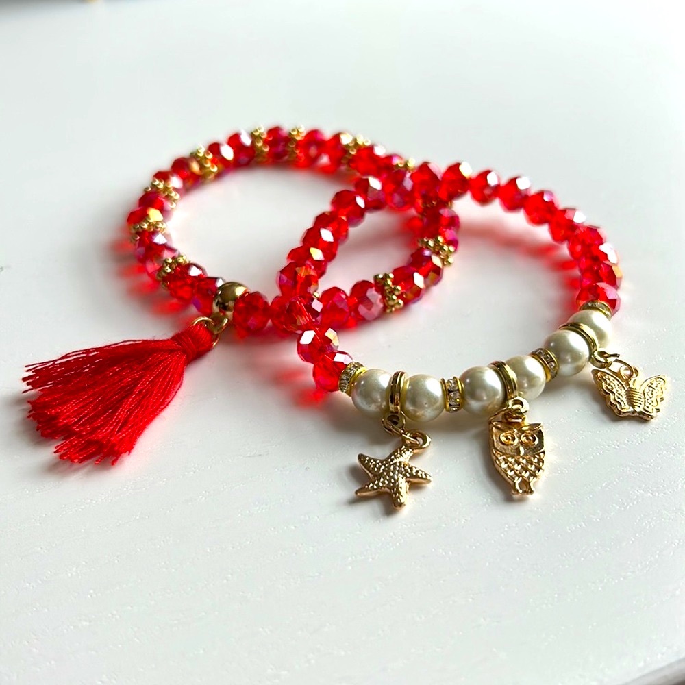 Beautiful beaded bracelets with charms - Picture 1 of 3